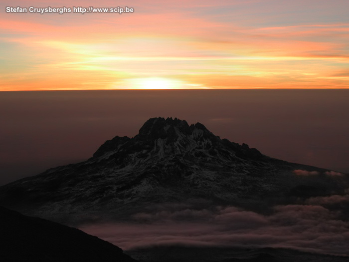 Kilimanjaro - Day 5 - Mawenzi seen from Uhuru Sunrise with a view on Mawenzi. If everyting goes to plan, you sit on the edge of the Kibo crater at sunrise. You will have a marvellous view on the opposite Mawenzi volcano.<br />
 Stefan Cruysberghs